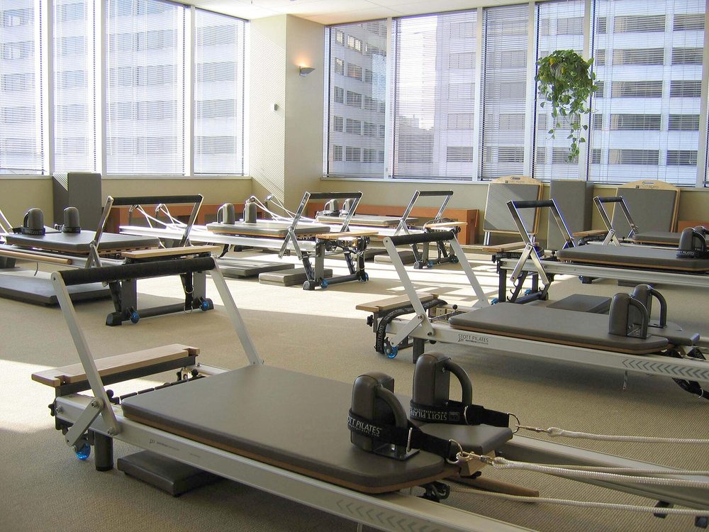 A bright studio set up for a pilates class